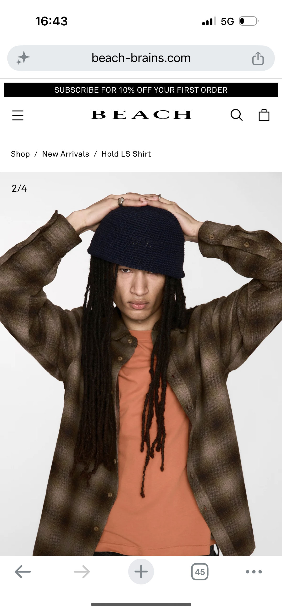 Adriano Orlando does the development for Beach Brains with Meide Engineering. Screenshot of the Beach Brains Hold LS Shirt in Brown Plaid.